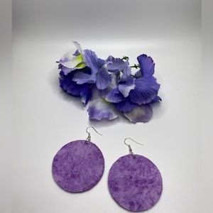 Purple dangle earrings.